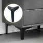 Metal three-pronged support leg bracket installed under a sofa frame, dark finish