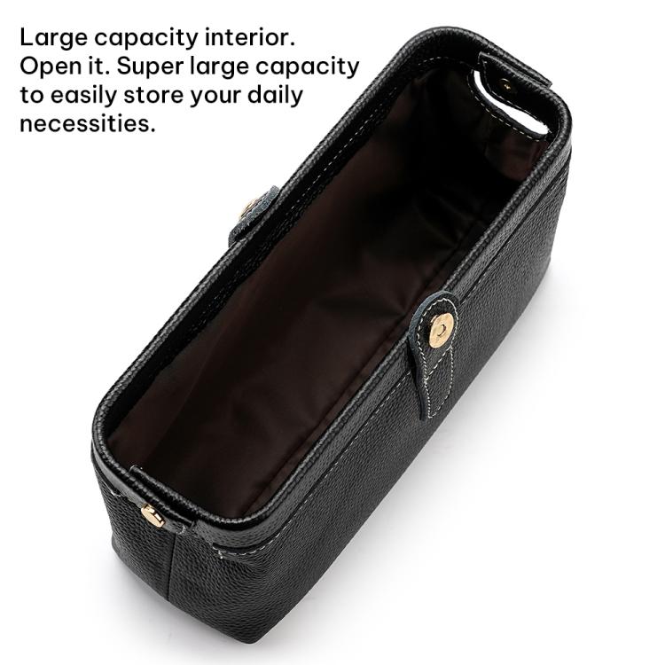 Black genuine leather makeup tool storage bag with open top and visible interior