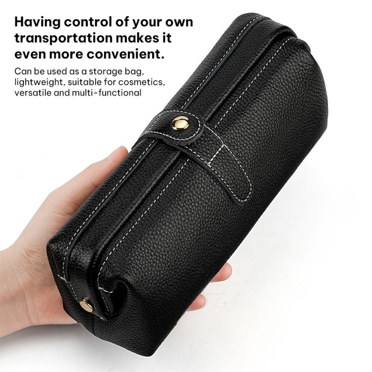 Black genuine leather makeup tool storage bag, side view with snap button closure