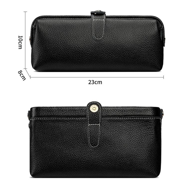Black leather makeup tool storage bag with front snap strap and top handle