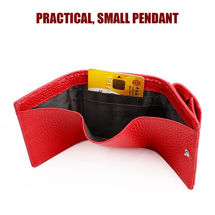 Red genuine leather wallet open, showing card slot inside