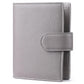 Light gray leather-look passport holder with attached notebook cover and side strap