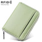 Mini RFID leather zipper card bag, light green pebbled finish, front card divider.