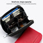 Black leather zip card bag interior with compartments, paired with red wallet