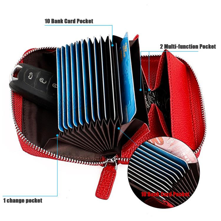 Red leather zip card holder opened to reveal multiple card pockets