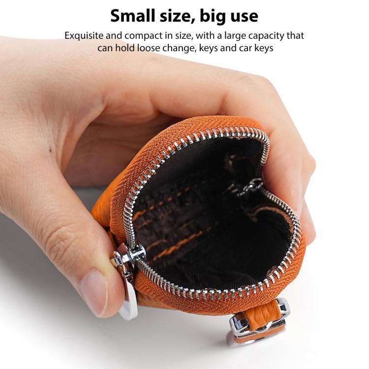 Orange textured mini leather coin pouch with metal zipper and key ring clip