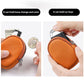 Orange mini leather coin pouch with zipper, showing car key and coin storage clips