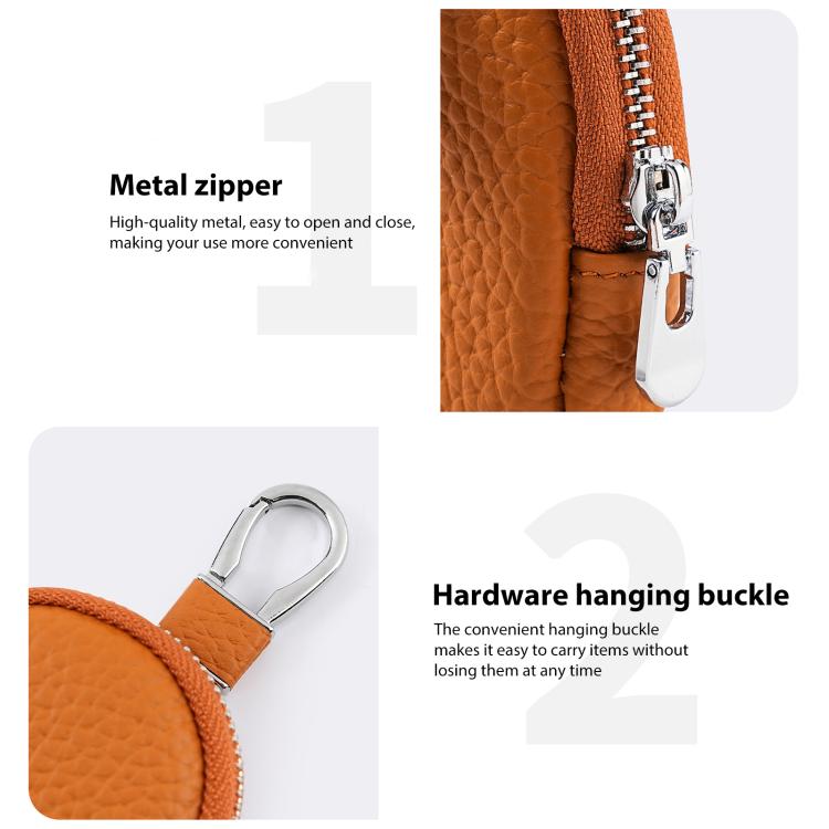 Orange leather coin pouch detail: metal zipper and hanging buckle key clip