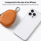Orange textured mini leather coin pouch with key ring clip, compact size for everyday carry