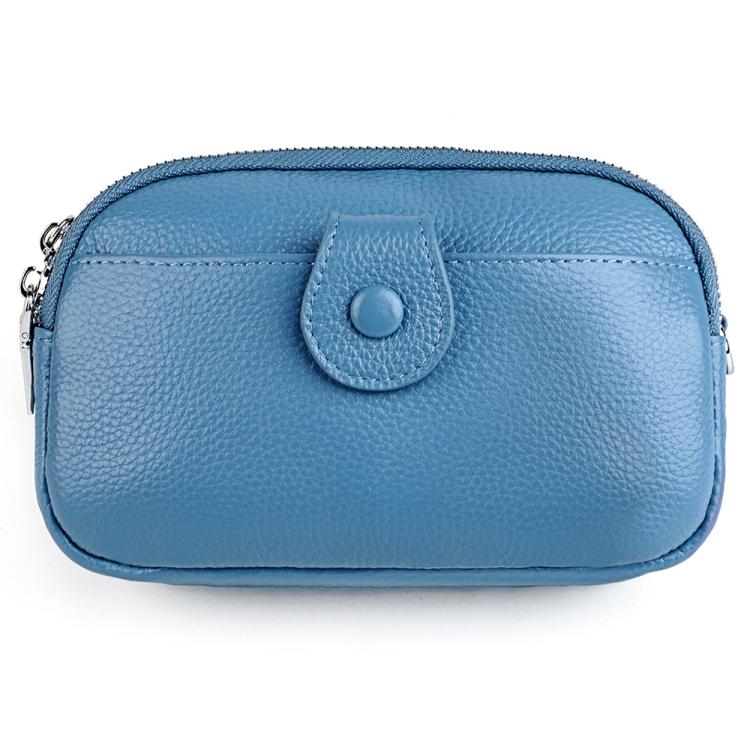 Light blue genuine leather crossbody bag with top zipper and rounded front pocket detail