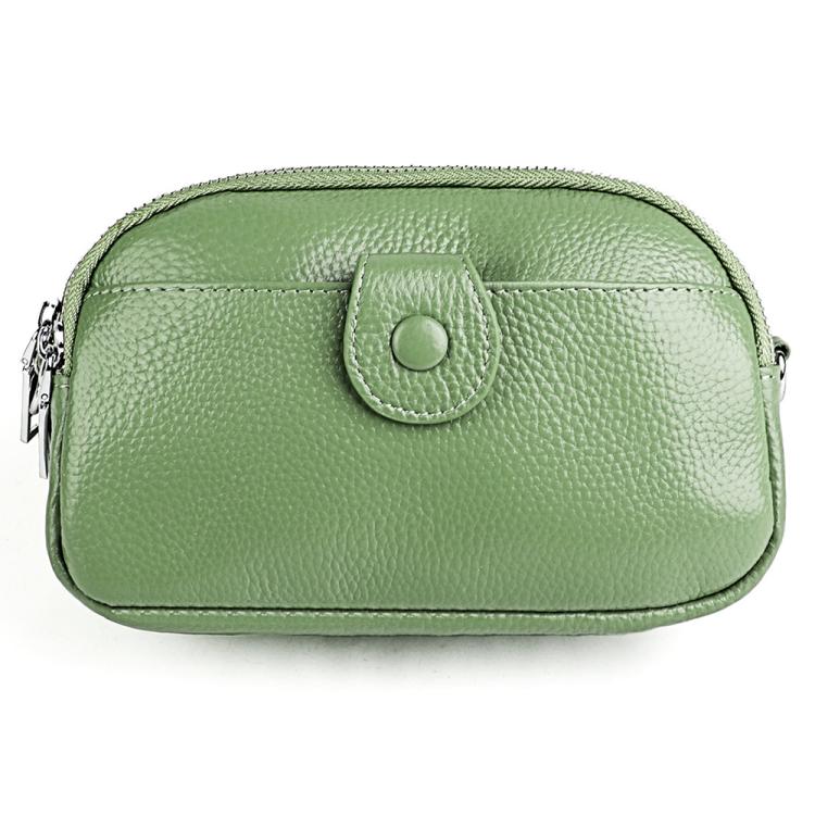 Light green genuine leather crossbody bag with top zipper and rounded front pocket detail