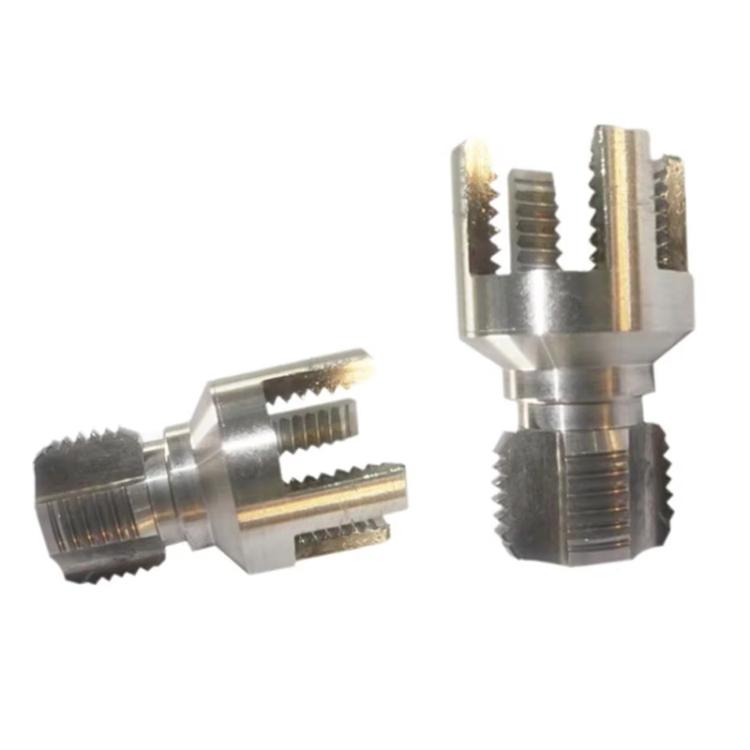 Pair of integrated thread cutting tools with silver metal bodies and mounted cutting heads