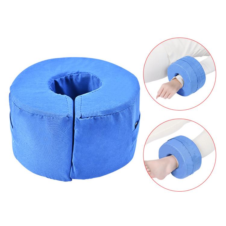 Blue round ankle support cushion with center opening and seam lines
