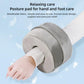 Gray ankle ring care cushion with center hole for hand or foot support