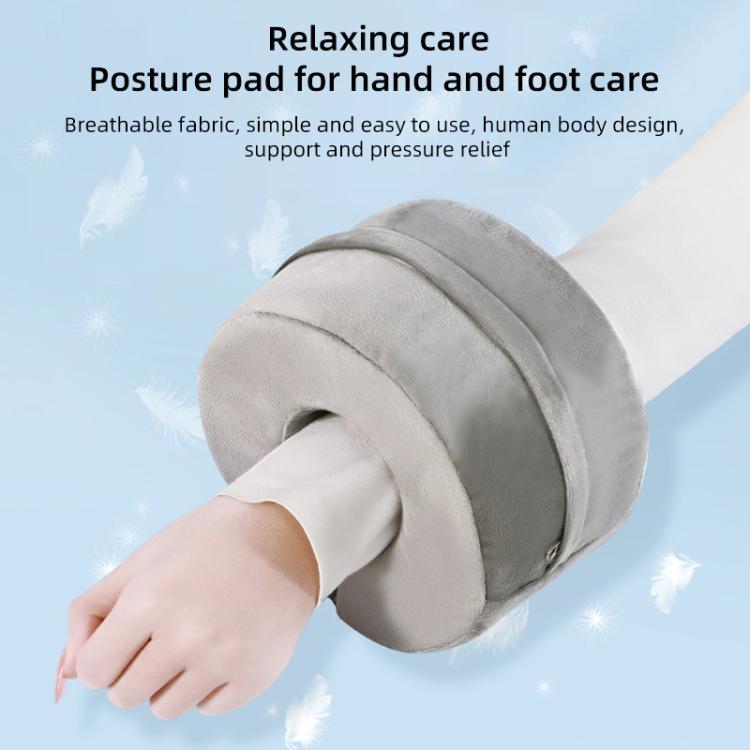 Gray ankle ring care cushion with center hole for hand or foot support