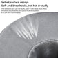 Gray velvet-textured cushion surface with stitched seam detail