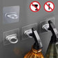 Set of clear adhesive hooks with transparent curved loops on square backing