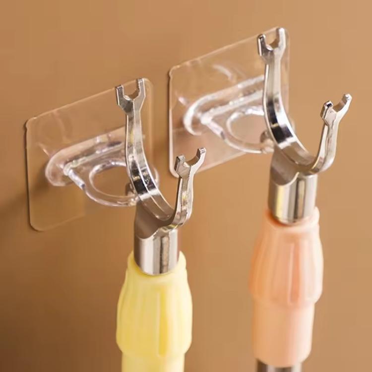 Clear adhesive hooks with curved holders on wall for bottles or accessories