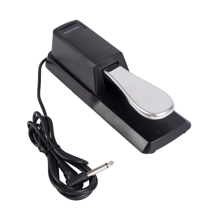 Black piano sustain pedal with silver footplate and attached audio cable