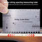 Guitar string action ruler measuring string spacing on a guitar bridge