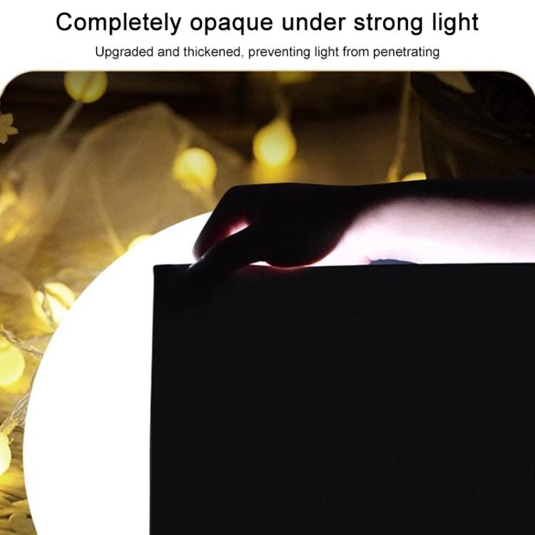 Frosted black aquarium glass film, matte opaque surface over bright light