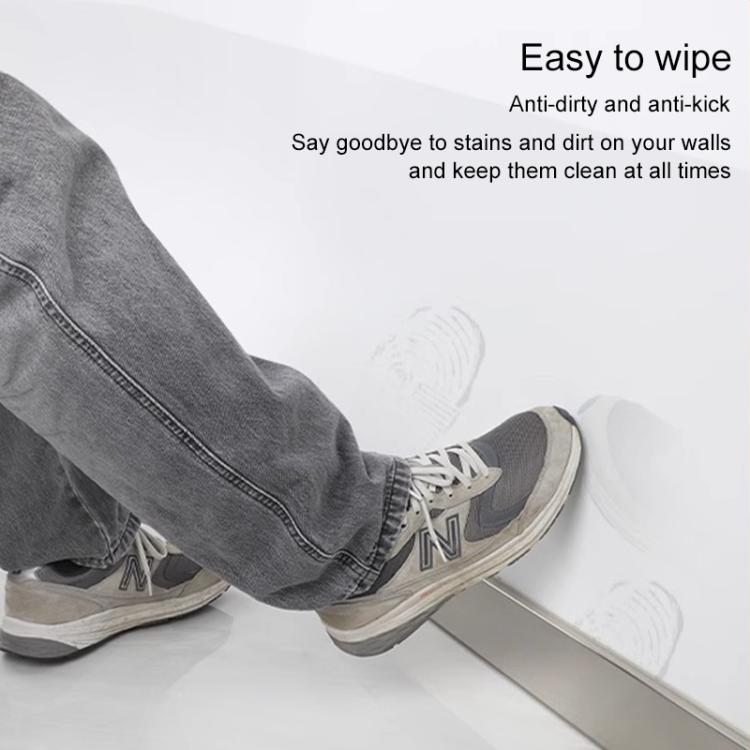 Transparent electrostatic wall protective film on a baseboard area, easy-wipe surface
