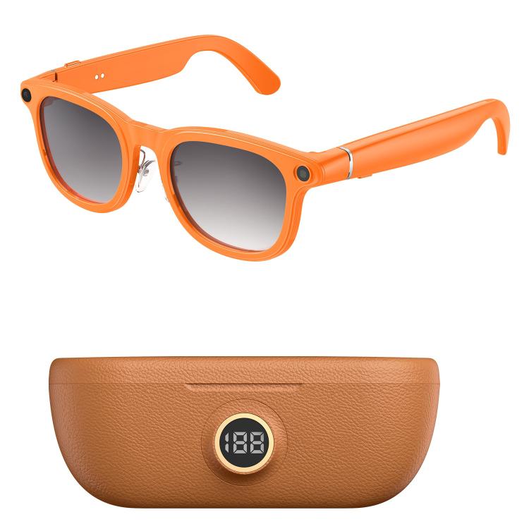 Orange smart glasses with gradient lenses and a brown charging case with digital display