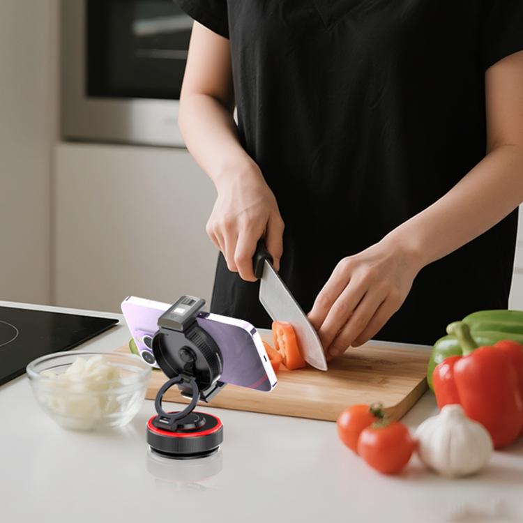 Compact phone holder with magnetic mount and suction base, black device cradle with red ring