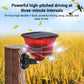 Solar panel top with glowing red translucent animal repellent bulb and black base