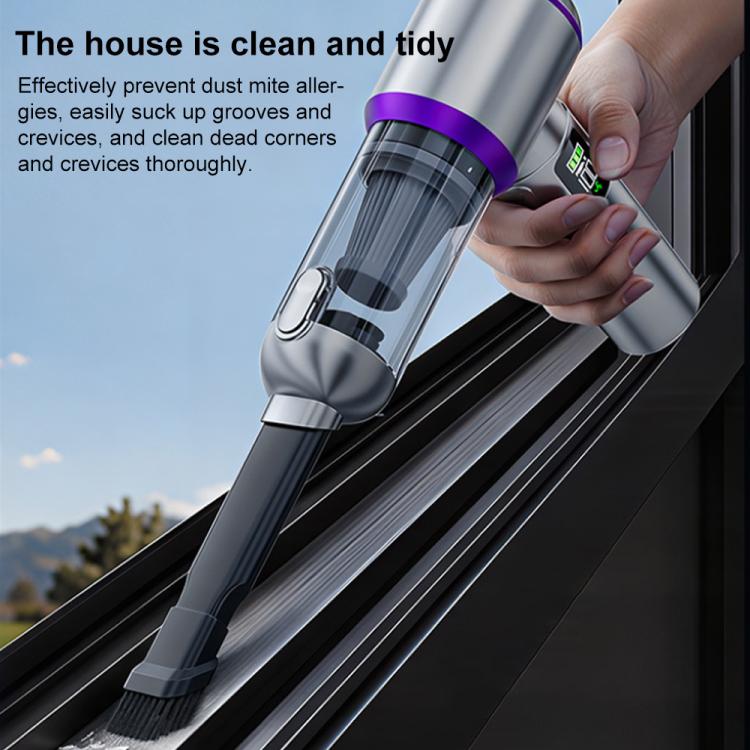 Handheld vacuum cleaner with purple accents cleaning a narrow window track