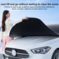 Car cover arched over hood and windshield with front securing straps and orange tabs
