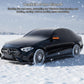 Dark car cover covering roof and hood on a sedan with orange tabs and reflective edge