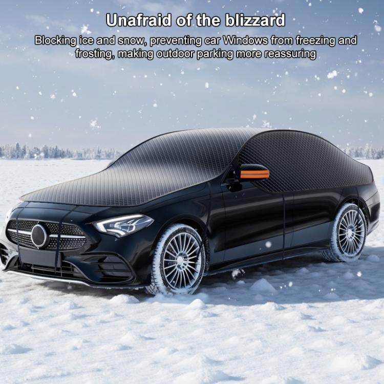 Dark car cover covering roof and hood on a sedan with orange tabs and reflective edge