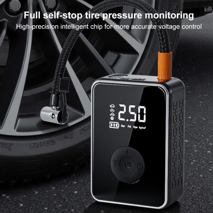 Portable air pump with orange nozzle cap and LED pressure display, compact black design