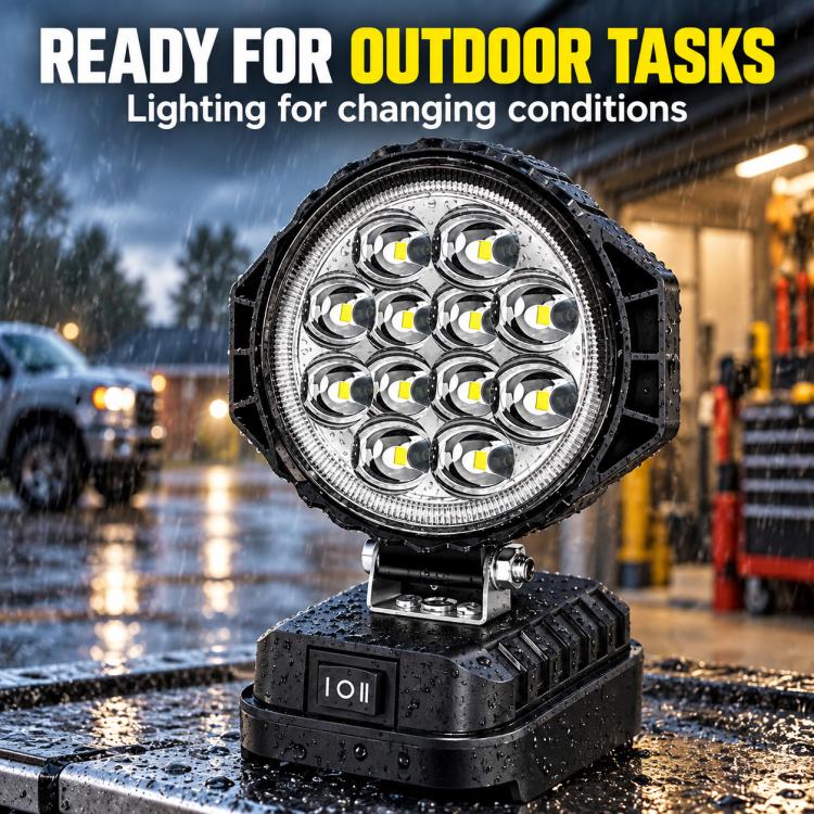 Round black LED emergency work light on base with multi-LED array and pivot mount.