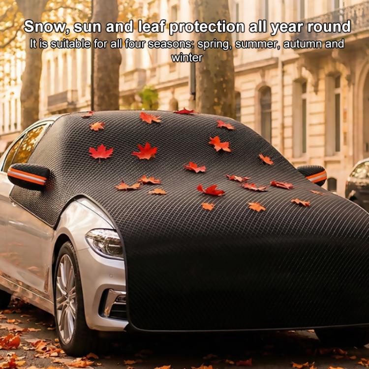 Half car cover with orange leaf pattern on dark textured fabric and orange trim details.