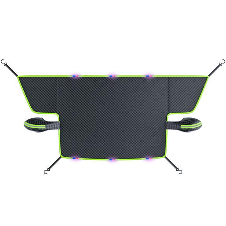 Black car windshield half cover with green trim and hook straps