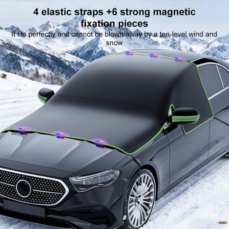 Black car windshield half cover with green trim and elastic strap attachment