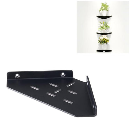 Black triangular wall-mounted acrylic shelf with perforated slots and screw holes