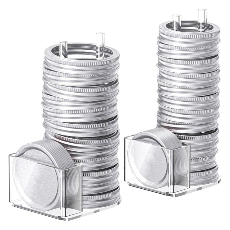 Transparent acrylic lid storage rack holding stacked mason jar lids with two posts