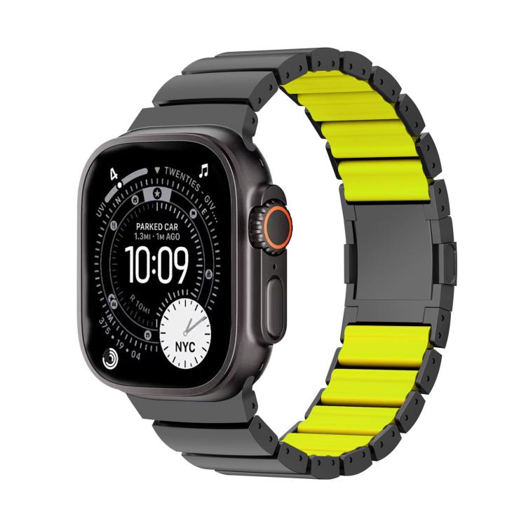 Dark gray Apple Watch band with bright yellow-green inner links, shown attached to a watch.