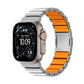 Silver metal watch band with orange silicone links and a magnetic clasp.