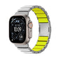 Silver metal watch band with bright yellow silicone links and a magnetic clasp.