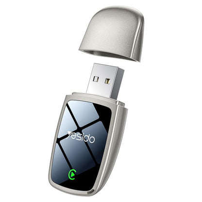 Wired-to-wireless CarPlay converter with silver USB plug and black indicator window