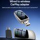 Wireless CarPlay adapter in silver with dual USB ports and black status screen