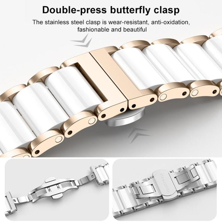 Close-up of a rose gold and white ceramic stainless steel watch band and butterfly clasp.
