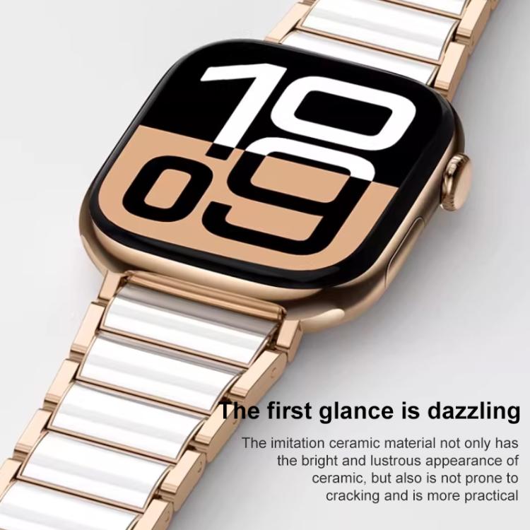 Rose gold and white ceramic stainless steel watch band attached to a smartwatch, close-up.