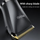 Black trimmer blade head with gold teeth, angled close-up on cordless clipper.