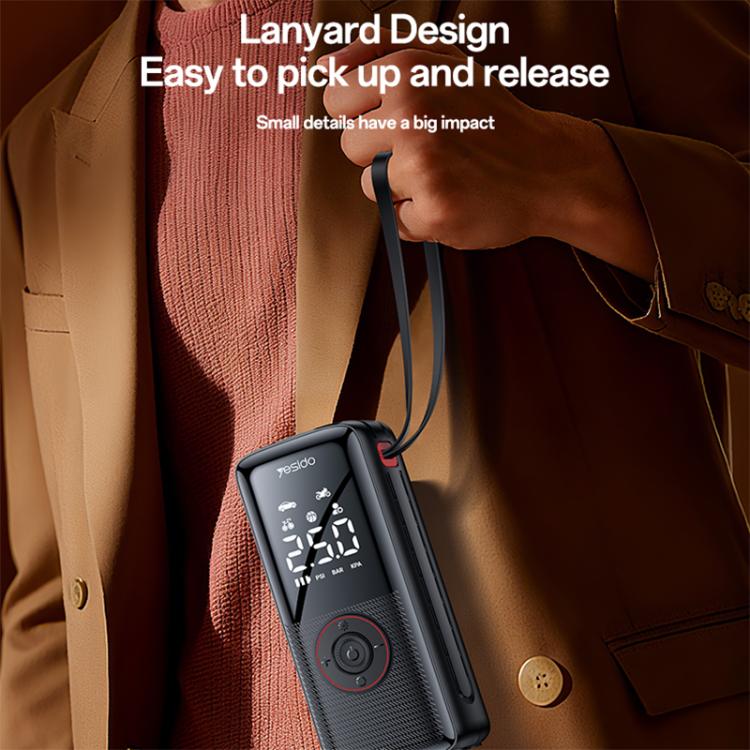 Cordless tire inflator with digital LED display and lanyard, shown in hand