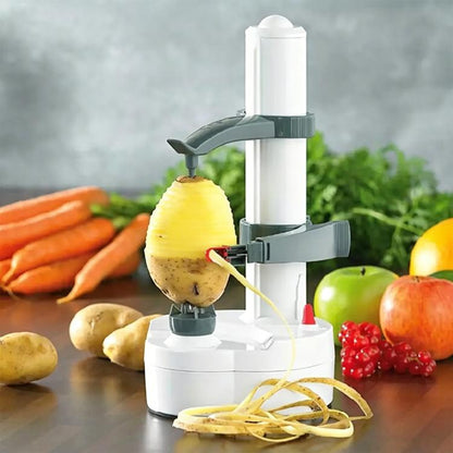 White electric vegetable peeler with potato and spiral peel ribbons